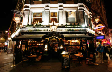 London, UK - Dec 11, 2012: Outside view of pub, for drinking and socializing, focal point of community. Pub business, now about 53,500 pubs in the UK, has been declining every year.のeditorial素材
