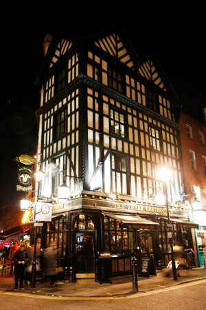 London, UK - Dec 11, 2012: Outside view of pub, for drinking and socializing, focal point of community. Pub business, now about 53,500 pubs in the UK, has been declining every year.のeditorial素材