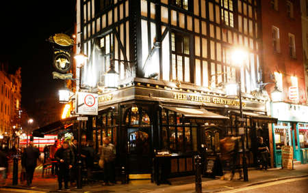 London, UK - Dec 11, 2012: Outside view of pub, for drinking and socializing, focal point of community. Pub business, now about 53,500 pubs in the UK, has been declining every year.のeditorial素材