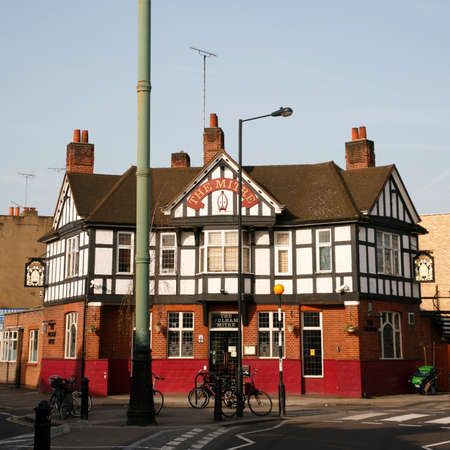 London, UK - March 29, 2012: Outside view of pub, for drinking and socializing, focal point of community. Pub business, now about 53,500 pubs in the UK, has been declining every year.のeditorial素材