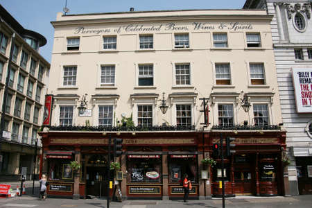 London, UK - May 25, 2010: Outside view of pub, for drinking and socializing, focal point of community. Pub business, now about 53,500 pubs in the UK, has been declining every year.のeditorial素材