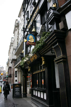 London, UK - May 08, 2010: Outside view of pub, for drinking and socializing, focal point of community. Pub business, now about 53,500 pubs in the UK, has been declining every year.のeditorial素材