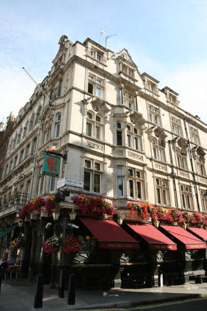 London, UK - September 02, 2010: Outside view of pub, for drinking and socializing, focal point of community. Pub business, now about 53,500 pubs in the UK, has been declining every year.のeditorial素材