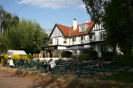 London, UK - May 17, 2010: Outside view of pub, for drinking and socializing, focal point of community. Pub business, now about 53,500 pubs in the UK, has been declining every year.のeditorial素材
