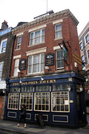 London, UK - May 25, 2010: Outside view of pub, for drinking and socializing, focal point of community. Pub business, now about 53,500 pubs in the UK, has been declining every year.のeditorial素材