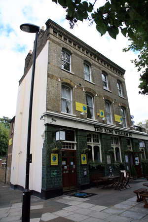 London, UK - September 16, 2010: Outside view of pub, for drinking and socializing, focal point of community. Pub business, now about 53,500 pubs in the UK, has been declining every year.のeditorial素材