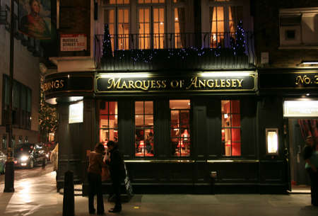 London, UK - November 06, 2010: Outside view of pub, for drinking and socializing, focal point of community. Pub business, now about 53,500 pubs in the UK, has been declining every year.のeditorial素材