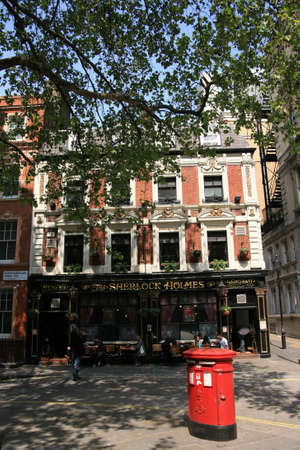 London, UK - May 25, 2010: Outside view of pub, for drinking and socializing, focal point of community. Pub business, now about 53,500 pubs in the UK, has been declining every year.のeditorial素材