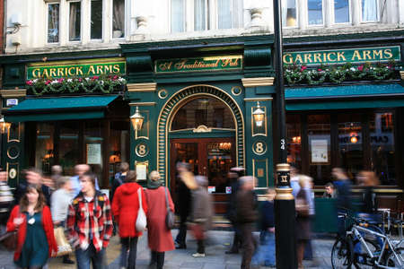 London, UK - November 06, 2010: Outside view of pub, for drinking and socializing, focal point of community. Pub business, now about 53,500 pubs in the UK, has been declining every year.のeditorial素材