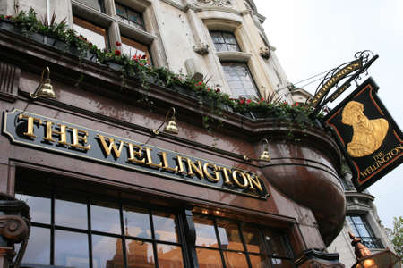 London, UK - November 11, 2010: Outside view of pub, for drinking and socializing, focal point of community. Pub business, now about 53,500 pubs in the UK, has been declining every year.のeditorial素材