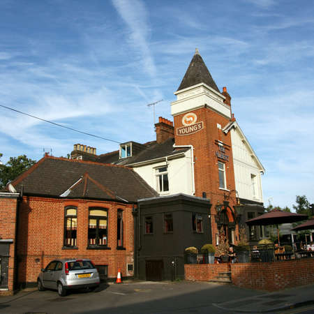 London, UK - July 19, 2010: Outside view of pub, for drinking and socializing, focal point of community. Pub business, now about 53,500 pubs in the UK, has been declining every year.のeditorial素材
