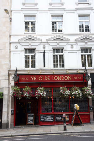London, UK - September 14, 2010: Outside view of pub, for drinking and socializing, focal point of community. Pub business, now about 53,500 pubs in the UK, has been declining every year.のeditorial素材