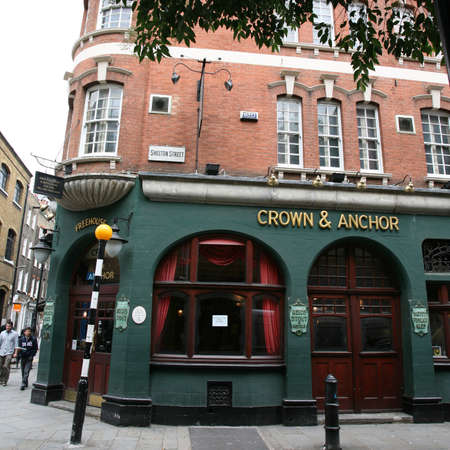 London, UK - August 16, 2010: Outside view of pub, for drinking and socializing, focal point of community. Pub business, now about 53,500 pubs in the UK, has been declining every year.のeditorial素材