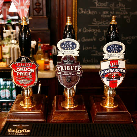 London, UK - May 5, 2012: Inside view of a public house, known as pub, for drinking and socializing, is the focal point of the community, Pub business has been declining every year.のeditorial素材