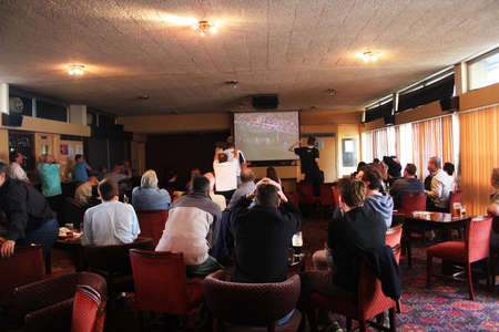 London, UK - May 13, 2006: Inside view of a public house, known as pub, for drinking and socializing, is the focal point of the community, Pub business has been declining every year.のeditorial素材