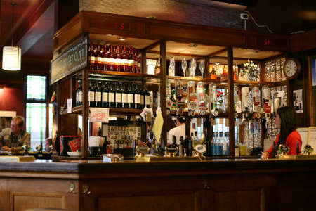 London, UK - May 07, 2010: Inside view of a public house, known as pub, for drinking and socializing, is the focal point of the community, Pub business has been declining every year.のeditorial素材