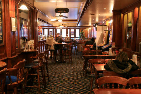 London, UK - December 01, 2010: Inside view of a public house, known as pub, for drinking and socializing, is the focal point of the community, Pub business has been declining every year.のeditorial素材