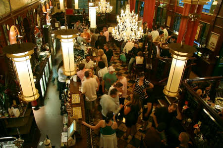 London, UK - June 03, 2006: Inside view of a public house, known as pub, for drinking and socializing, is the focal point of the community, Pub business has been declining every year.のeditorial素材