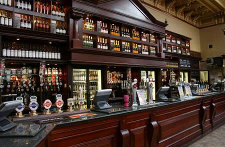 Edinburgh, UK - July 24, 2010: Inside view of a public house, known as pub, for drinking and socializing, is the focal point of the community, Pub business has been declining every year.のeditorial素材