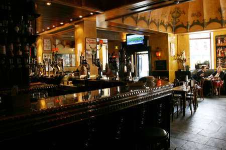 Edinburgh, UK - July 23, 2010: Inside view of a public house, known as pub, for drinking and socializing, is the focal point of the community, Pub business has been declining every year.のeditorial素材