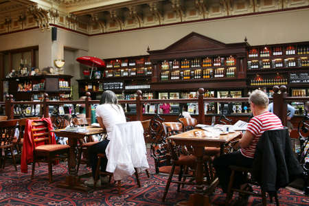 Edinburgh, UK - July 24, 2010: Inside view of a public house, known as pub, for drinking and socializing, is the focal point of the community, Pub business has been declining every year.のeditorial素材