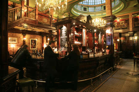 London, UK - November 04, 2010: Inside view of a public house, known as pub, for drinking and socializing, is the focal point of the community, Pub business has been declining every year.のeditorial素材