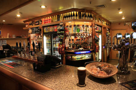 London, UK - September 17, 2010: Inside view of a public house, known as pub, for drinking and socializing, is the focal point of the community, Pub business has been declining every year.のeditorial素材