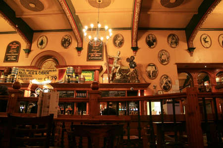 London, UK - October 28, 2010: Inside view of a public house, known as pub, for drinking and socializing, is the focal point of the community, Pub business has been declining every year.のeditorial素材