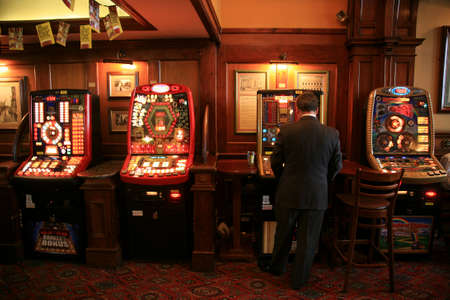 London, UK - November 04, 2010: Inside view of a public house, known as pub, for drinking and socializing, is the focal point of the community, Pub business has been declining every year.のeditorial素材