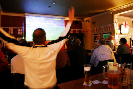 London, UK - June 24, 2012: Inside view of a public house, known as pub, for drinking and socializing, is the focal point of the community, Pub business has been declining every year.のeditorial素材