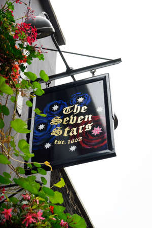 LONDON - SEP 5: English pub sign, Public house, known as pub, is focal point of community, on Sep 5, 2016, London, UK. Pub business, now about 53,500 pubs in UK, has been declining every year.のeditorial素材