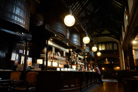 LONDON - SEP 5: Interior of pub, for drinking and socializing, focal point of the community, on Sep 5, 2016, London, UK. Pub business, now about 53,500 pubs in UK, has been declining every year.のeditorial素材