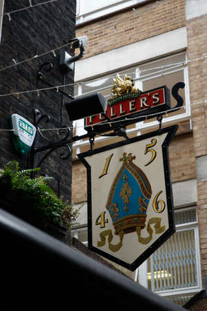 LONDON - SEP 5: English pub sign, Public house, known as pub, is focal point of community, on Sep 5, 2016, London, UK. Pub business, now about 53,500 pubs in UK, has been declining every year.のeditorial素材