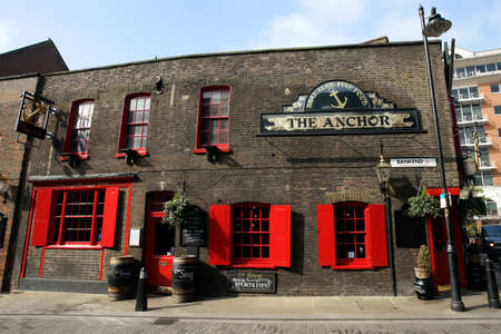 London , UK - March 11, 2016: Outside view of pub, for drinking and socializing, focal point of community. Pub business, now about 53,500 pubs in the UK, has been declining every year.のeditorial素材