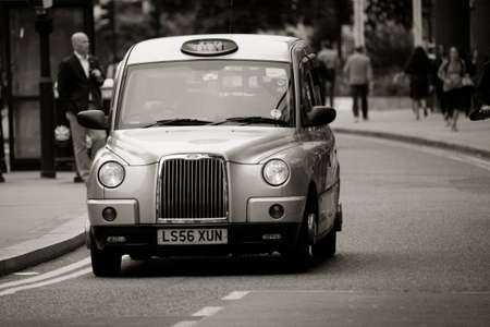 London, UK - June 14, 2012: TX4, London Taxi, also called hackney carriage, black cab. Traditionally Taxi cabs are all black in London but now produced in various colors.のeditorial素材