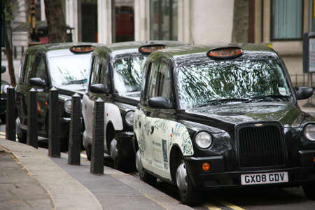 LONDON - MAY 8 : TX1 Hackney Carriage, also called London Taxi or Black Cab, at Strand on May 8, 2010 in London, UK. TX4 is manufactured by the London Taxis International, LTI.のeditorial素材