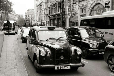 London, UK - May 6, 2012: FX4, London Taxi, also called hackney carriage, black cab. Traditionally Taxi cabs are all black in London but now produced in various colors.のeditorial素材