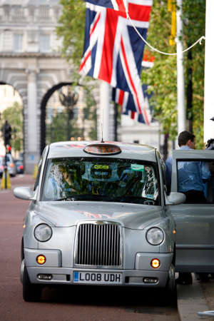 London, UK - June 13, 2012: London Taxi, also called hackney carriage, black cab. Traditionally Taxi cabs are all black in London but now produced in various colors.のeditorial素材