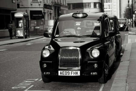 London, UK - April 30, 2012: TX4, London Taxi, also called hackney carriage, black cab. Traditionally Taxi cabs are all black in London but now produced in various colors.のeditorial素材