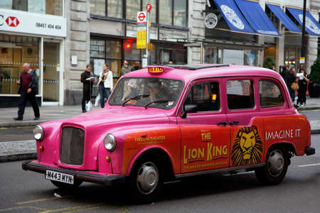 London, UK - Aug 27, 2011: London Taxi, also called hackney carriage, black cab. Traditionally Taxi cabs are all black in London but now produced in various colors.のeditorial素材