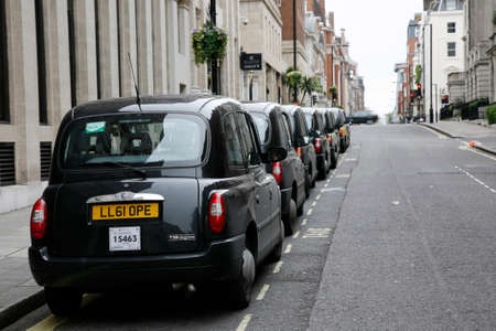 London, UK - May 5, 2012: TX4, London Taxi, also called hackney carriage, black cab. Traditionally Taxi cabs are all black in London but now produced in various colors.のeditorial素材