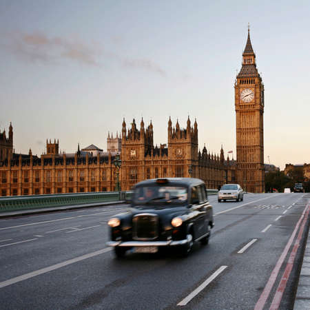 LONDON - OCT 27 : FX4 Hackney Carriage, also called London Taxi or Black Cab, on Westminster Bridge on October 27, 2012, London, UK. FX4 is manufactured by the London Taxis International, LTI.のeditorial素材