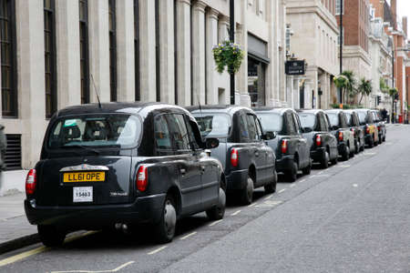 London, UK - May 5, 2012: TX4, London Taxi, also called hackney carriage, black cab. Traditionally Taxi cabs are all black in London but now produced in various colors.のeditorial素材