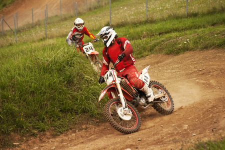 Motocross riders in raceの写真素材