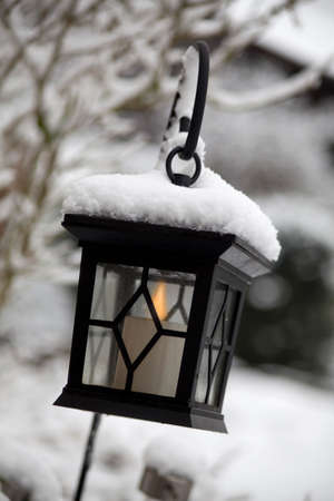 Lantern in the snowの写真素材