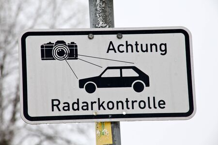 German language radar control sign warning car drivers about speed control. Text translation "Attention Radar control"の写真素材