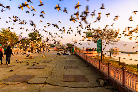 Jaipur, India-December,2018:  Street with people and Hindu Rajputna architecture building near Jal Mahal palace at Jaipur, Rajasthan.のeditorial素材