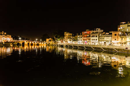 Udaipur, Rajasthan, India-October, 2018: Panoramic sunset view of Udaipur city at Lake Pichola from Ambrai Ghat which is famous tourist vacation destination in India.のeditorial素材