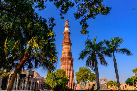 Qutub Minar is a highest minaret in India standing 73 m tall tapering tower of five storeys made of red sandstone and marble established in 1192. It is UNESCO world heritage site at  New Delhi,Indiaのeditorial素材