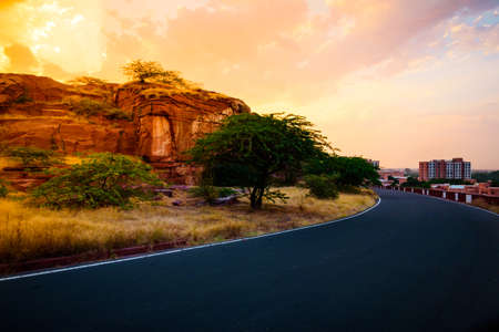 View enroute to Umaid Bhawan Palace through precambrian era red sandstone mountains which falls in Jodhpur Group-Malani Igneous Suite Contact geological monument in Aravalli Mountains,  Rajasthanの写真素材